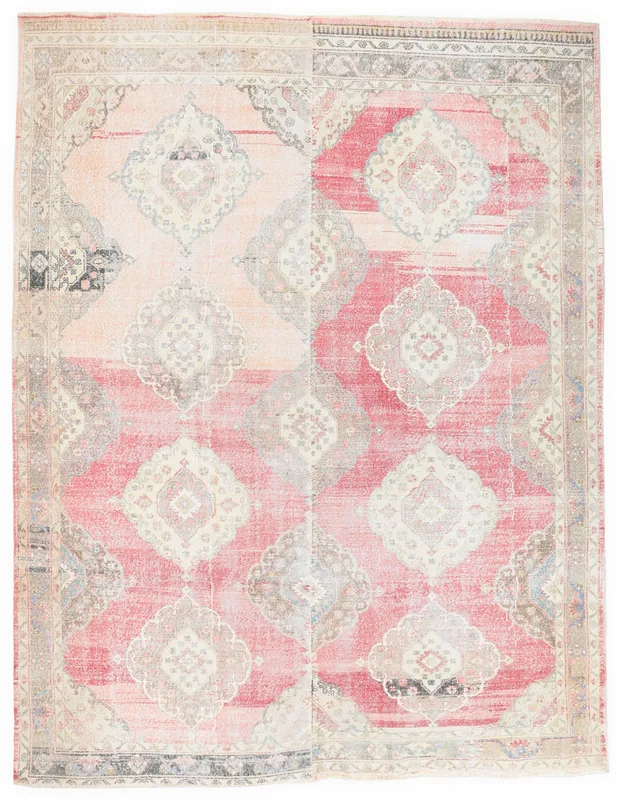 Full overhead view of the 8'9" x 11'5" rose and red distressed vintage Anatolian rug