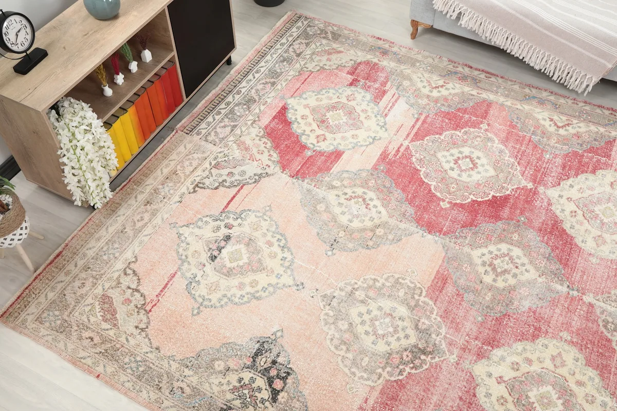 High angle detail of the rug's surface, revealing the low pile and color variations