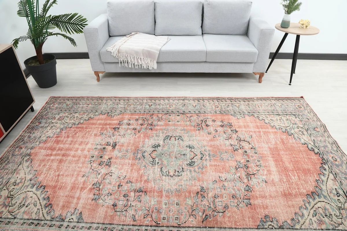Overhead view of the rug's central medallion and colors in a living room