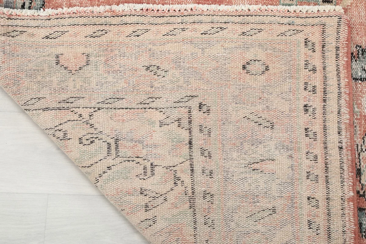 Detail of the hand-knotted cotton foundation on the back of the rug