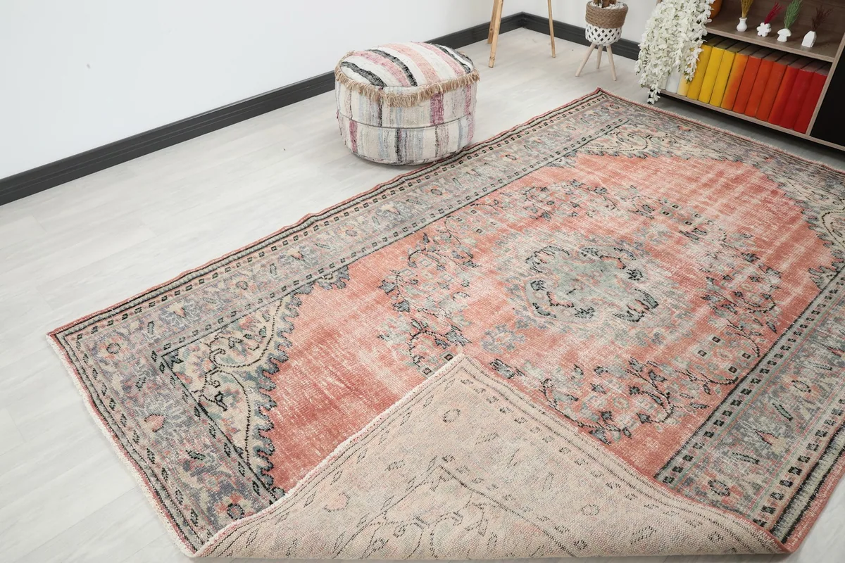 View showing the rug's cotton foundation and the reverse side pattern