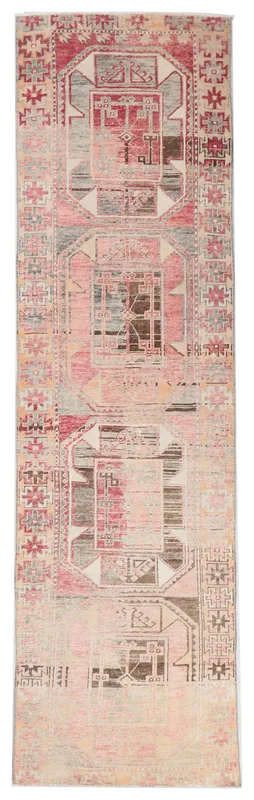 Full overhead view of the 3'3" x 11'8" vintage Anatolian runner on a white background
