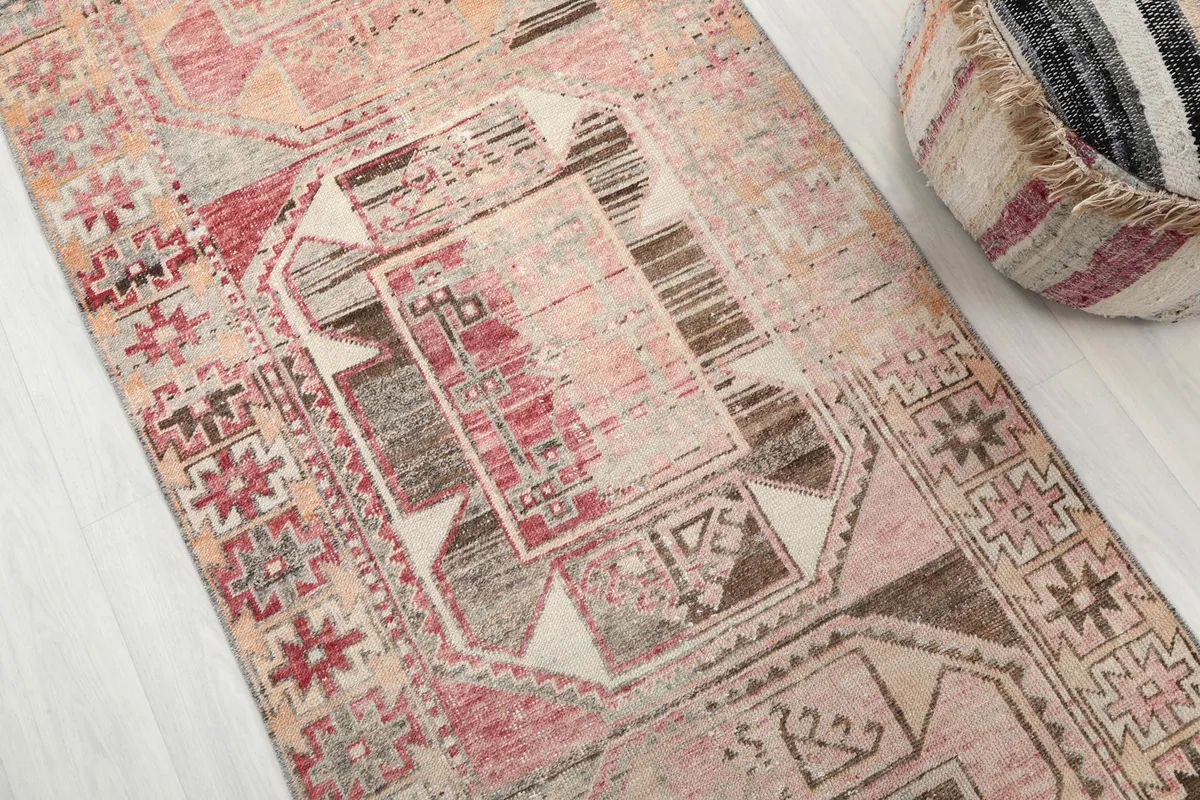 Detailed view of the runner's surface, capturing the low pile and color variations