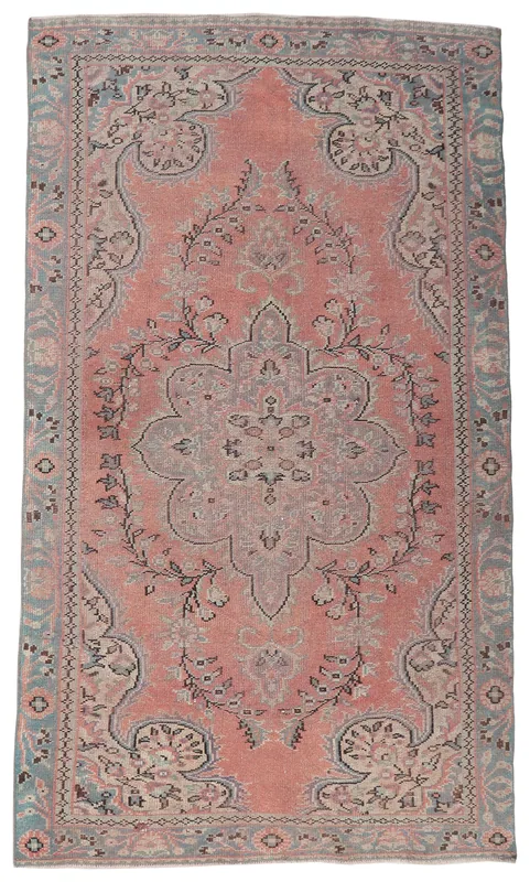 Full overhead view of the vintage rose and blue Anatolian rug