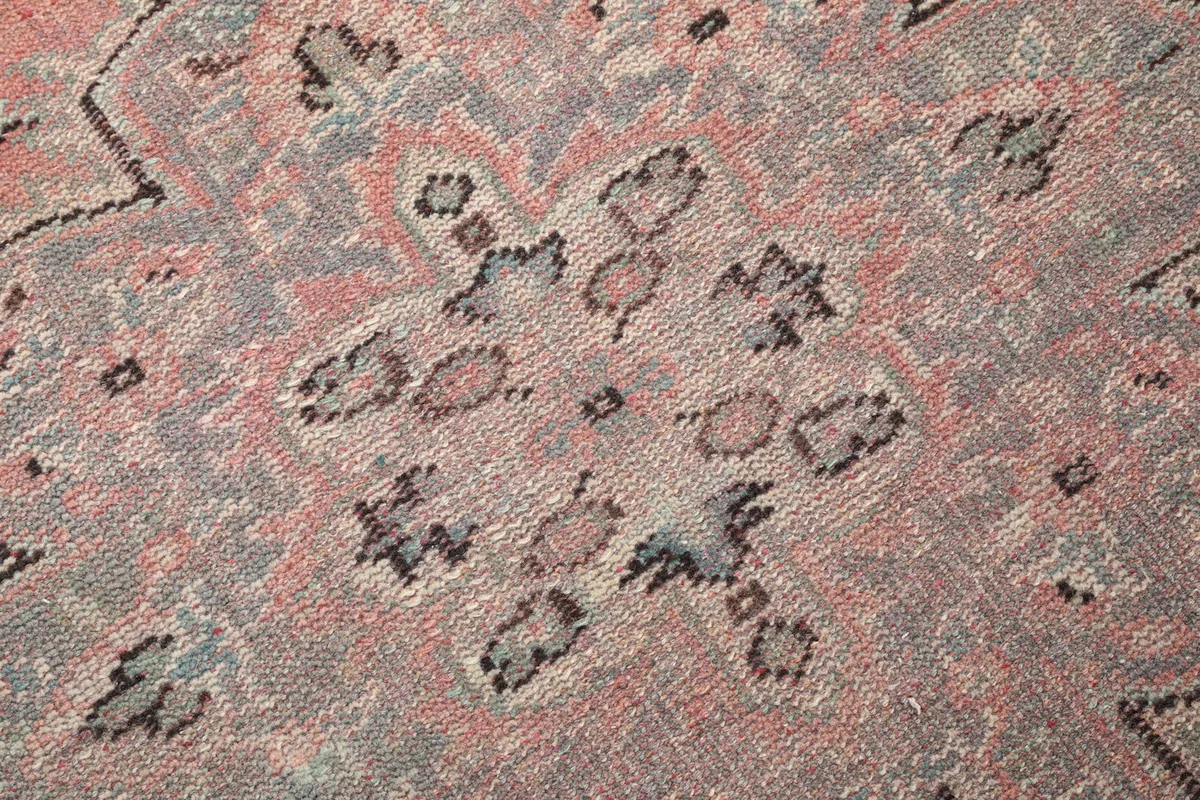 Close-up showing the textural detail and subtle color variations in the rug's pile