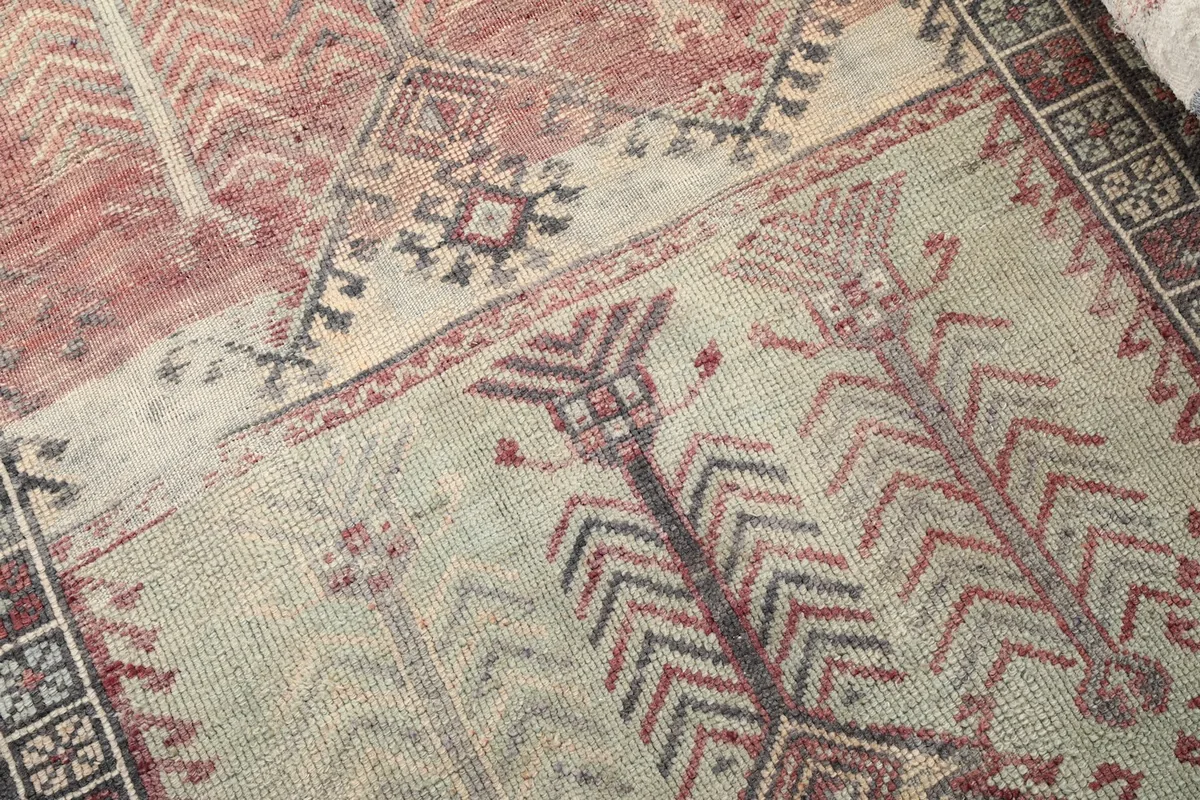 Close-up of the hand-knotted wool pile and specific geometric designs