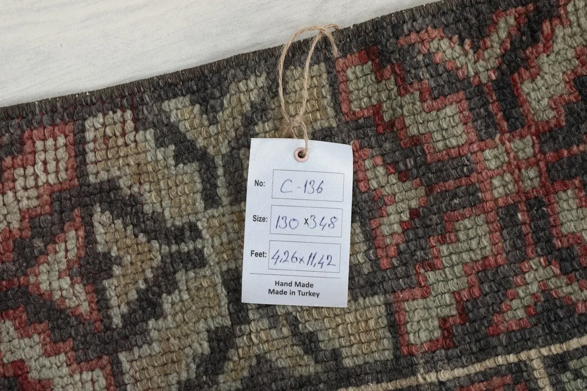 Close-up of the rug's label showing size and origin details
