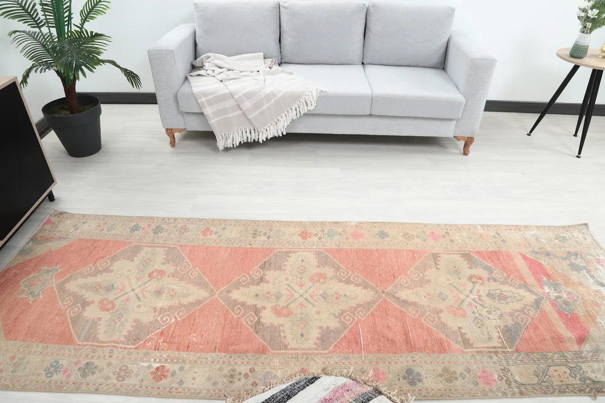 Overhead view of the vintage runner rug showcasing its full length in a room