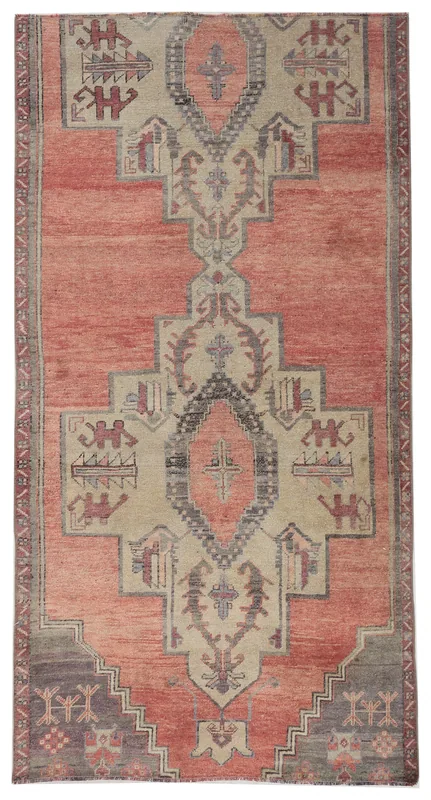 Full top view of the rose and beige vintage Anatolian wool runner with geometric tribal patterns