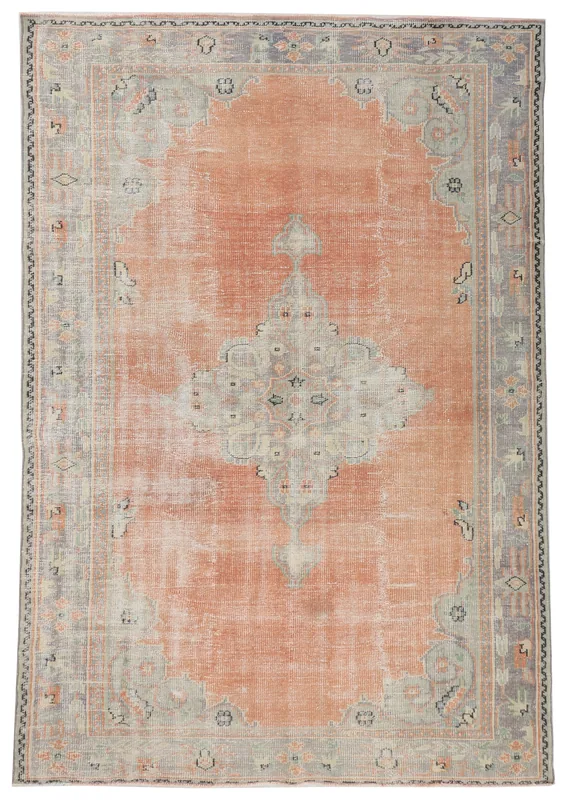 Full top view of the 6'4" x 9'3" vintage Anatolian rug with rust field and gray border