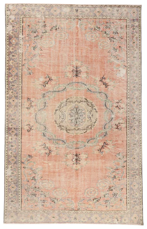 Full top view of the 6'2" x 9'6" vintage Anatolian area rug with a rose field and central medallion