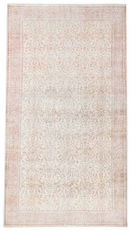 Full top view of the 5'1" x 9'1" ivory and rose vintage Anatolian rug