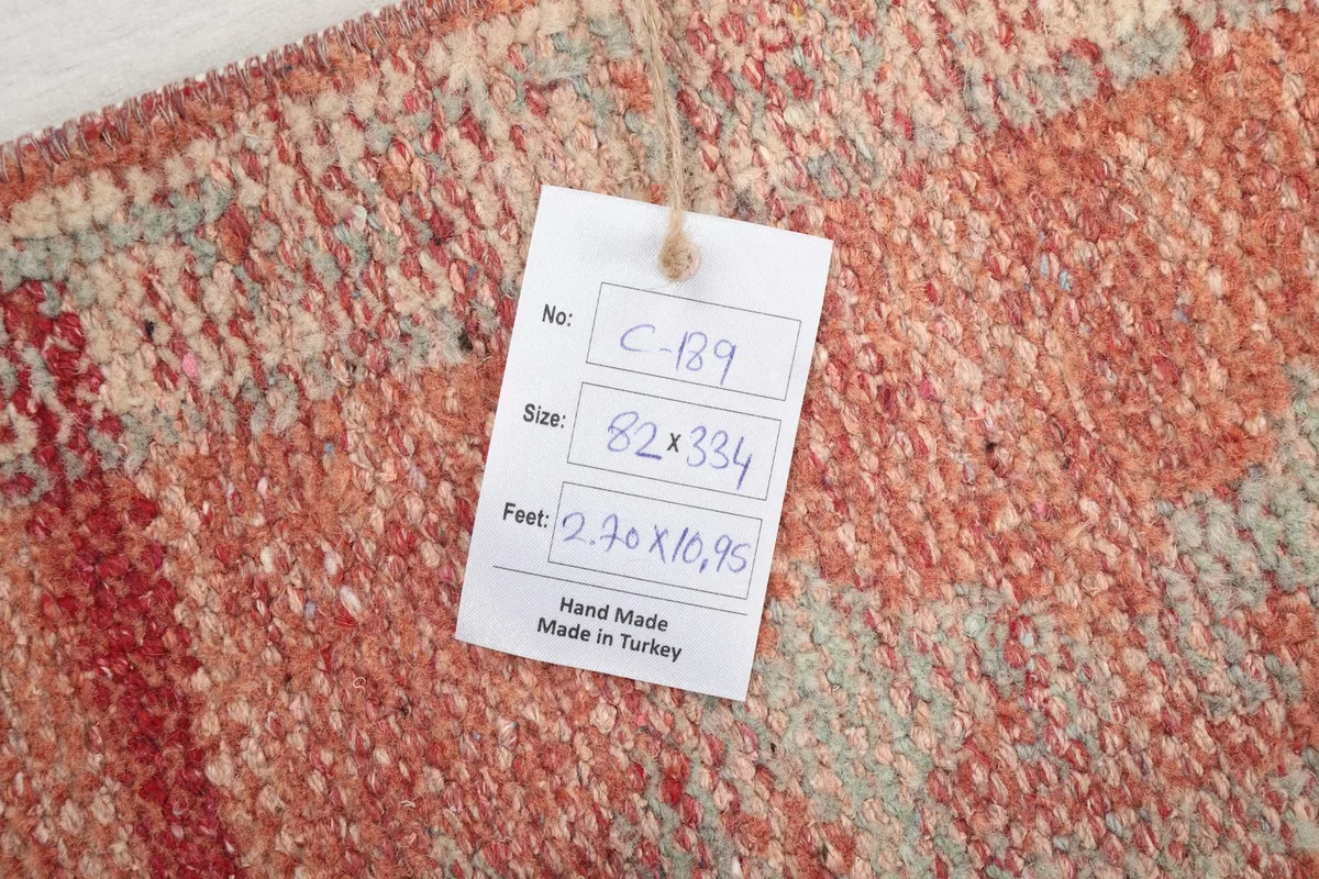 Tag showing the rug's details: C-189, 82x334 cm, 2.70x10.95 feet, hand made in Turkey
