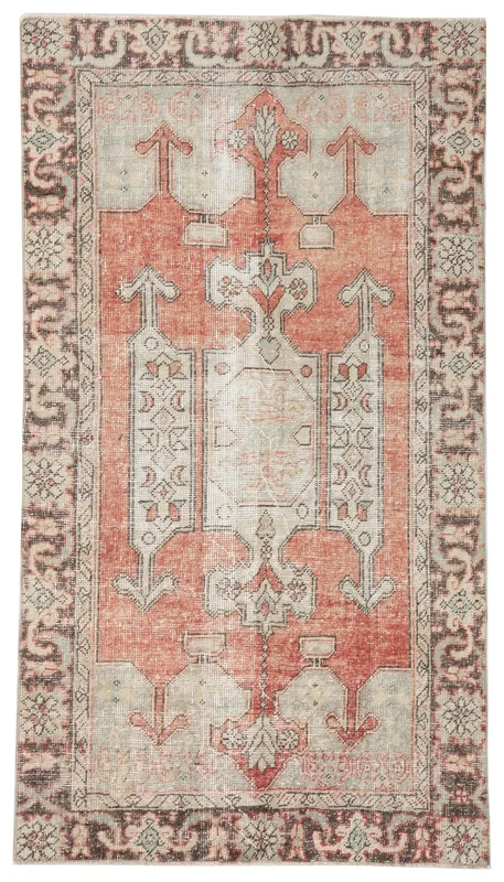 Full top view of a vintage Anatolian rug with a rust field and beige geometric patterns