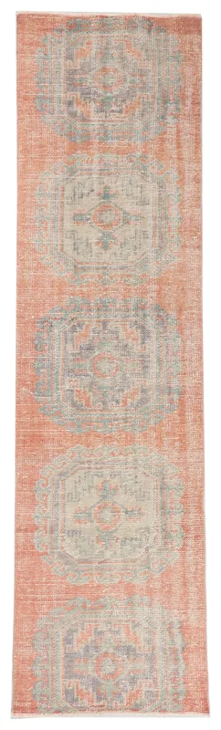 Full overhead view of a vintage rust and gray geometric Anatolian runner rug