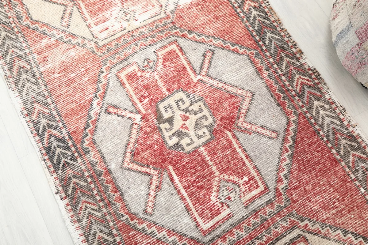 Detailed view of the central geometric medallion and surrounding patterns