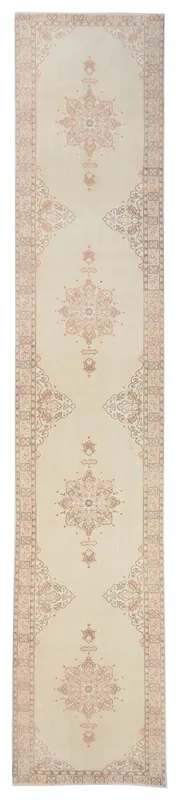 Full overhead view of the beige and rose vintage Anatolian runner rug