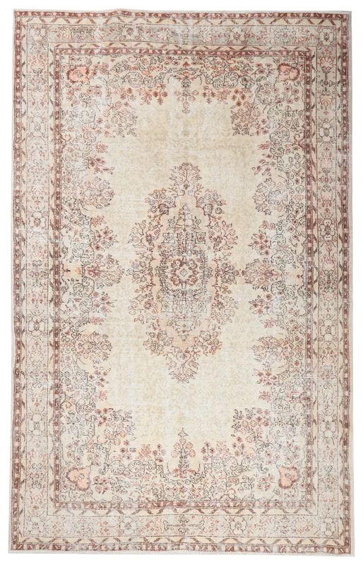 Full overhead view of the ivory and rose vintage Anatolian rug