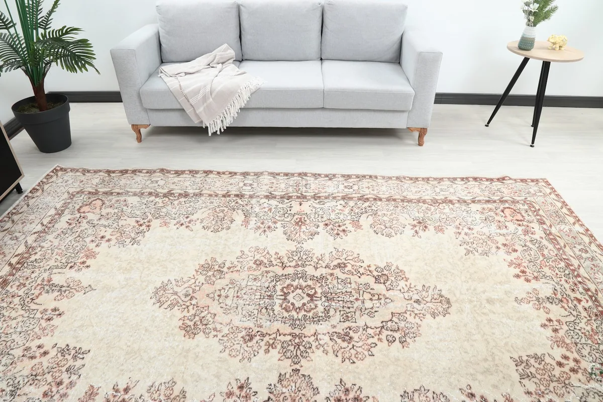 Overhead view showing the central medallion and field of the large area rug