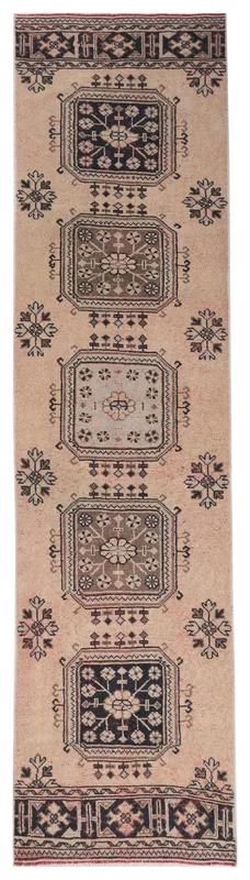 Full overhead view of the 3'1" x 12'0" vintage Anatolian runner rug with tan field and geometric panels.
