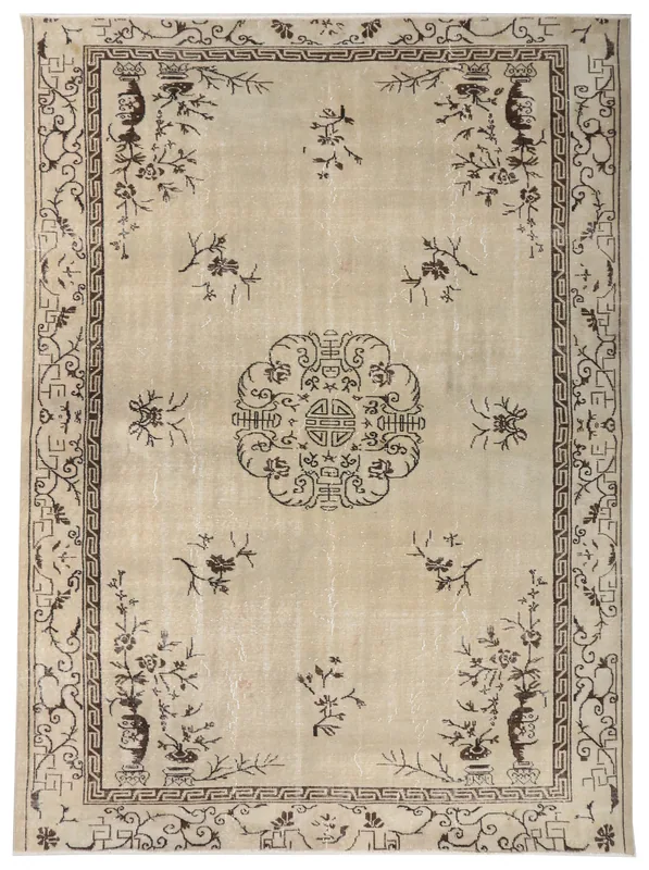 Full overhead view of the beige and brown vintage Anatolian area rug.