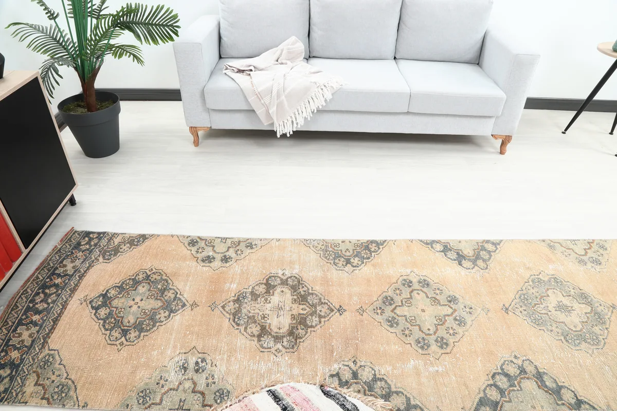 Overhead view of the Warm Beige Geometric Anatolian Runner showing its length