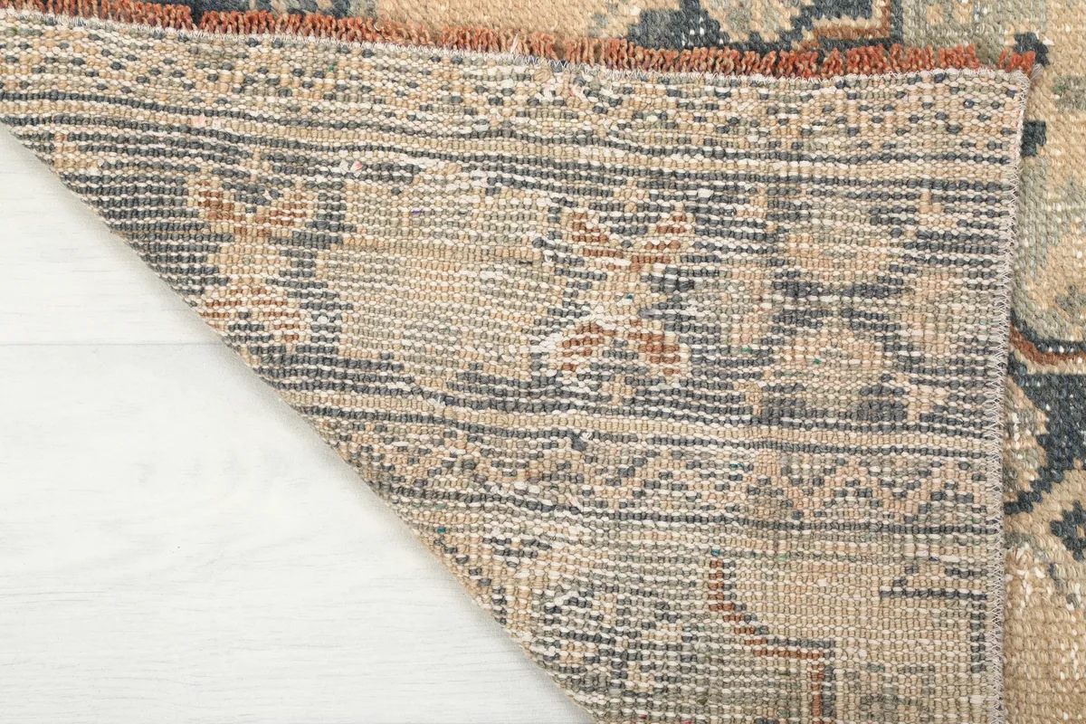 The hand-knotted cotton foundation and reverse side of the runner