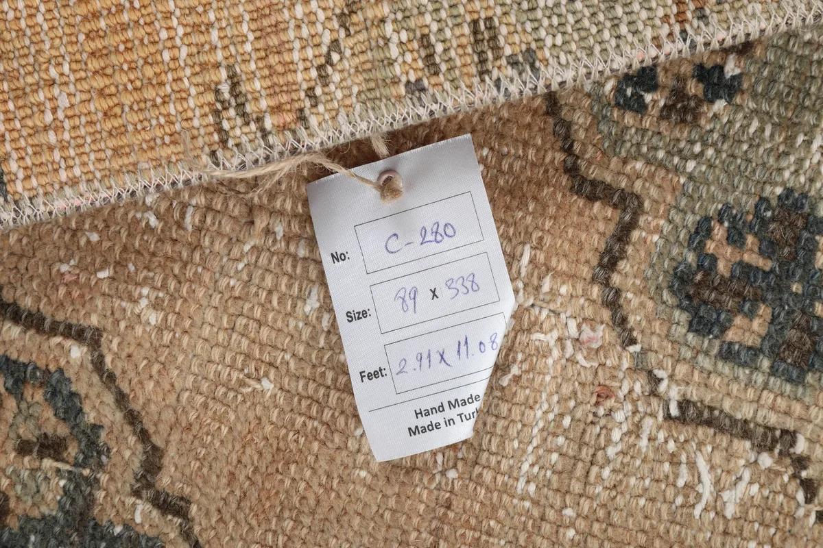 Care tag on the back of the hand-knotted Anatolian runner