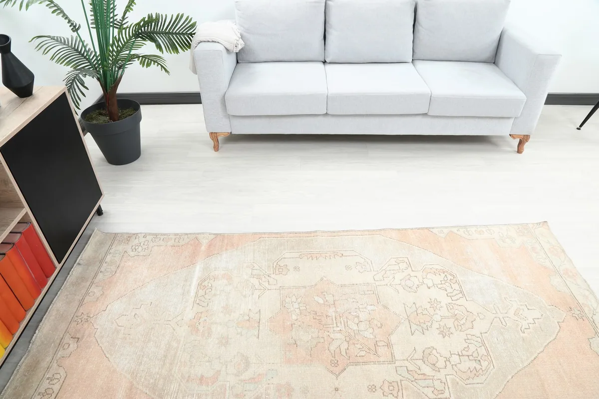 Overhead angle of the rug showing its placement in the room with a sofa