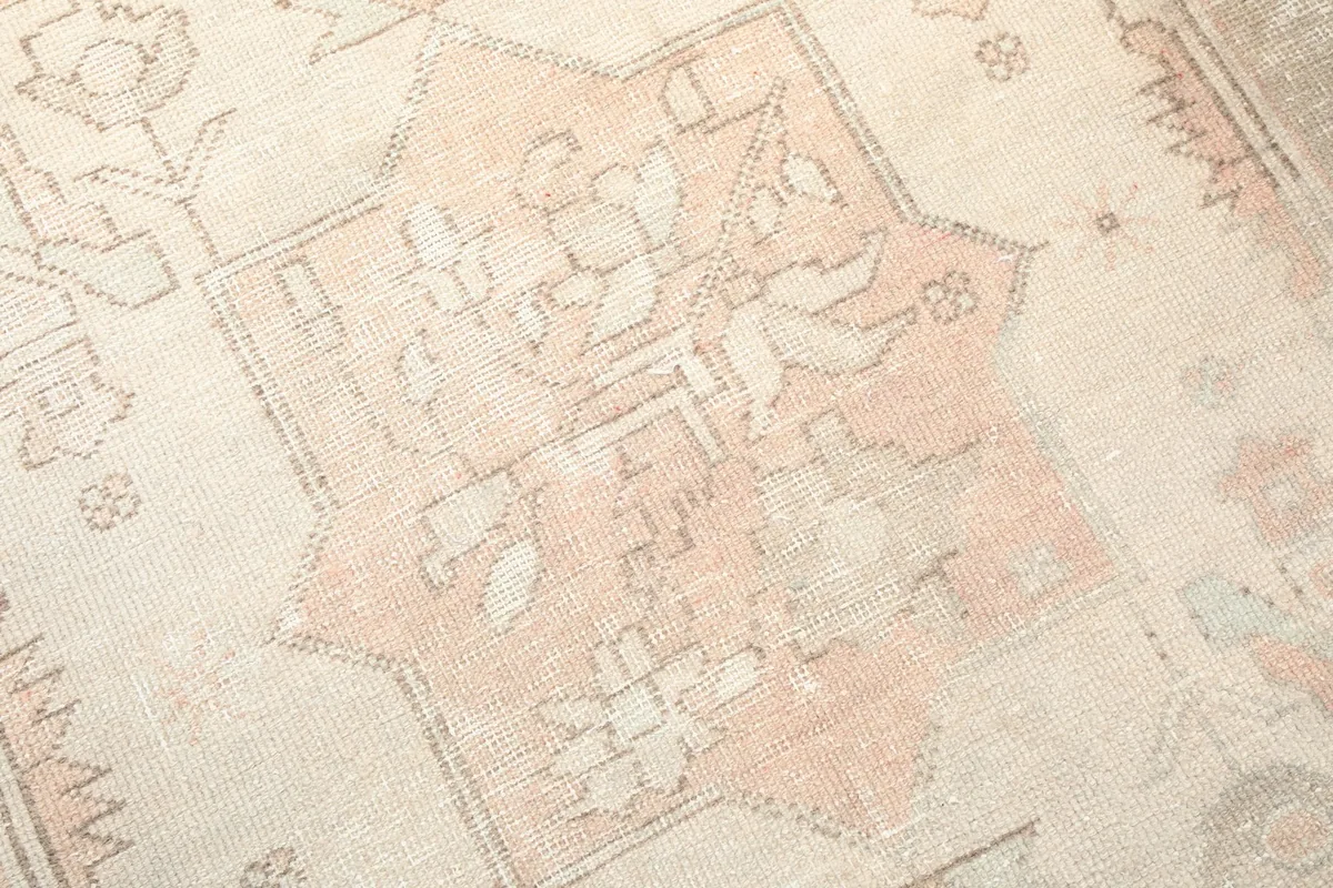 Close-up of the medallion's intricate floral and geometric motifs