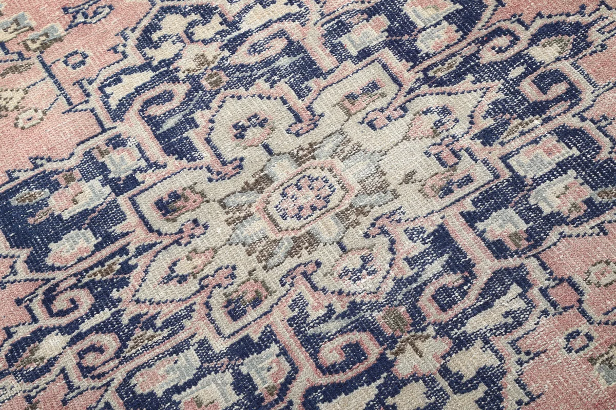 Intricate detail of the Rose Navy Medallion Anatolian Rug's patterns and texture.