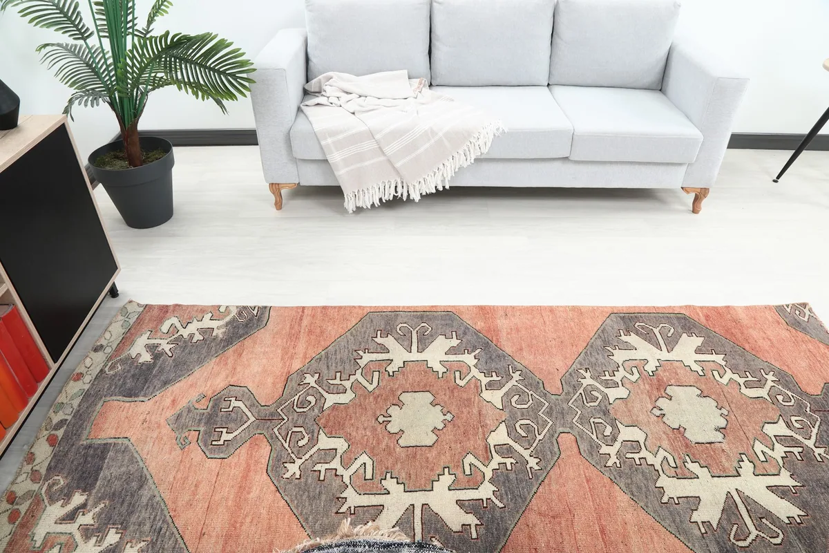Overhead view of the rug in a room, capturing its full length and design from above