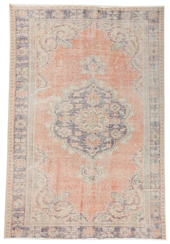 Full overhead view of the orange and blue vintage Anatolian rug