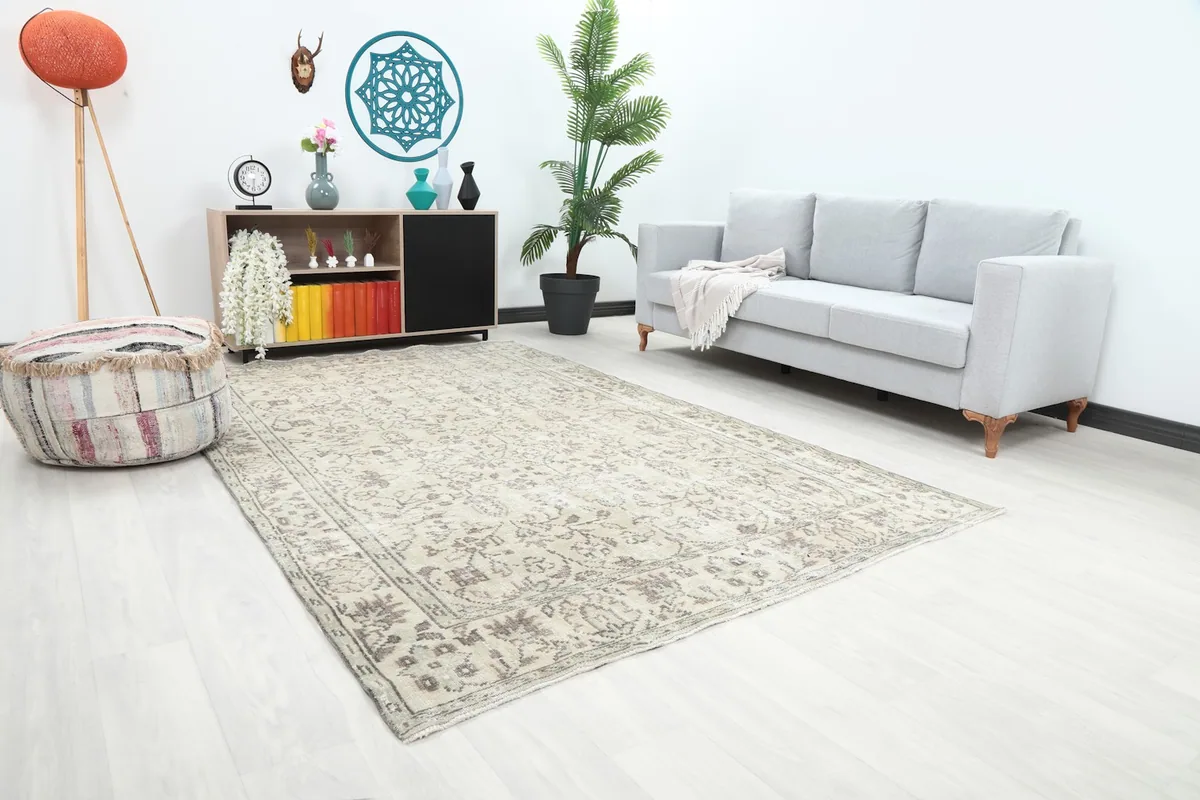 Angle view of the rug in a living room, highlighting its size relative to the furniture.