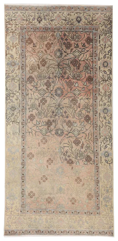 Full top view of the 3x6 rose and ivory floral vintage Anatolian rug on a white background.