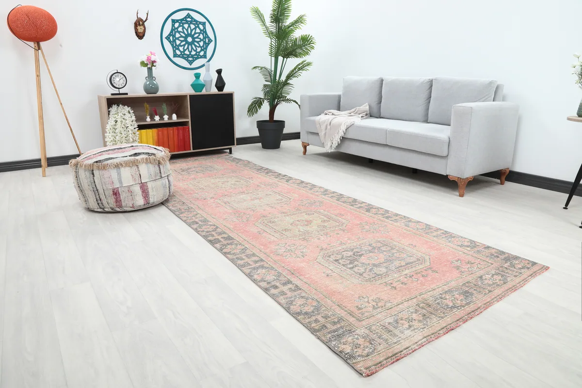 Faded Rose Geometric Anatolian Runner from a different angle in a contemporary room setting.