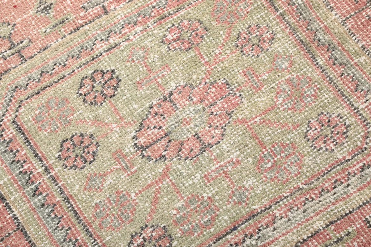 Texture and low pile of the Faded Rose Geometric Anatolian Runner, with visible knotting and color variation.
