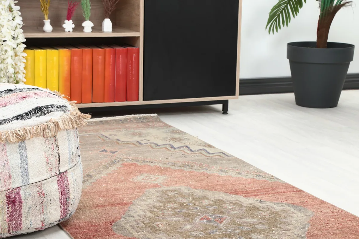 Close-up of the runner rug in a room, showing its texture and how it complements nearby furniture.