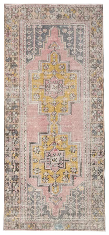 Full top view of the 4x8 pink and gold geometric Anatolian runner