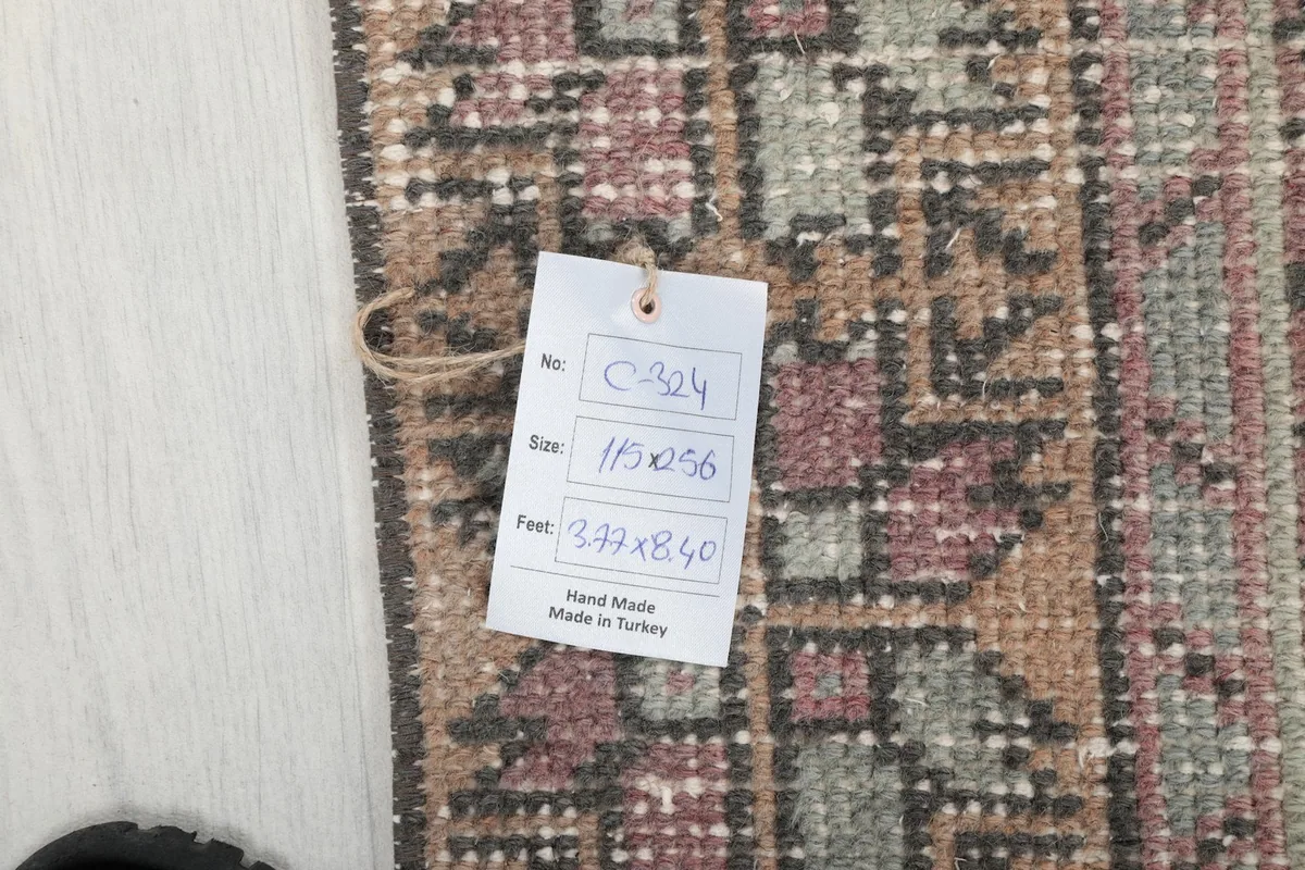 Tag showing the rug's size and origin, confirming it is hand-made in Turkey