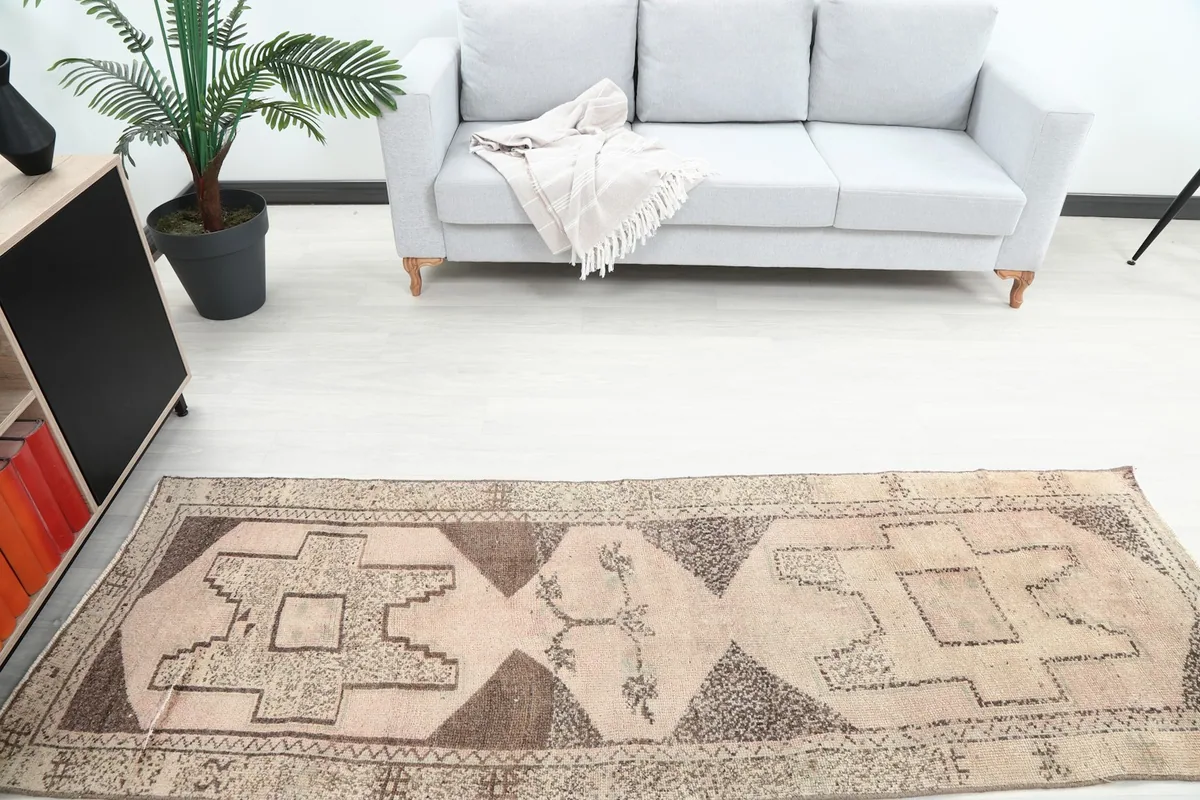 Overhead view of the runner rug in a room, showing its full length and design.