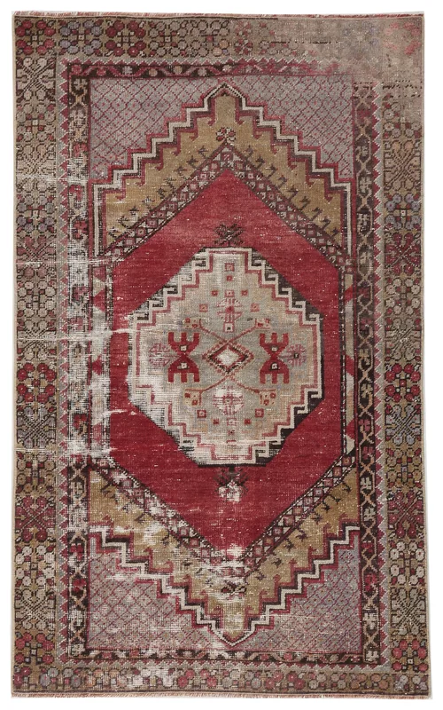 Full top view of the vintage Red Beige Tribal Medallion rug on a white background