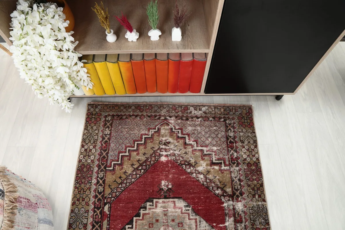 Direct overhead shot of the Red Beige Tribal Medallion rug, highlighting its central design