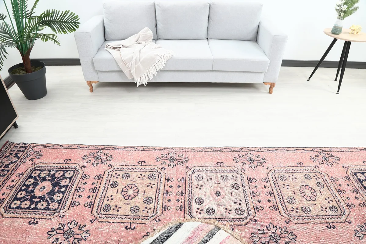 Overhead view of the rose runner in a room, highlighting its length and pattern flow