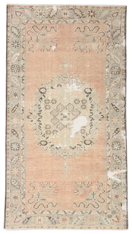Full top view of the 3'4" x 6'3" rose and gray vintage Anatolian rug on a white background.