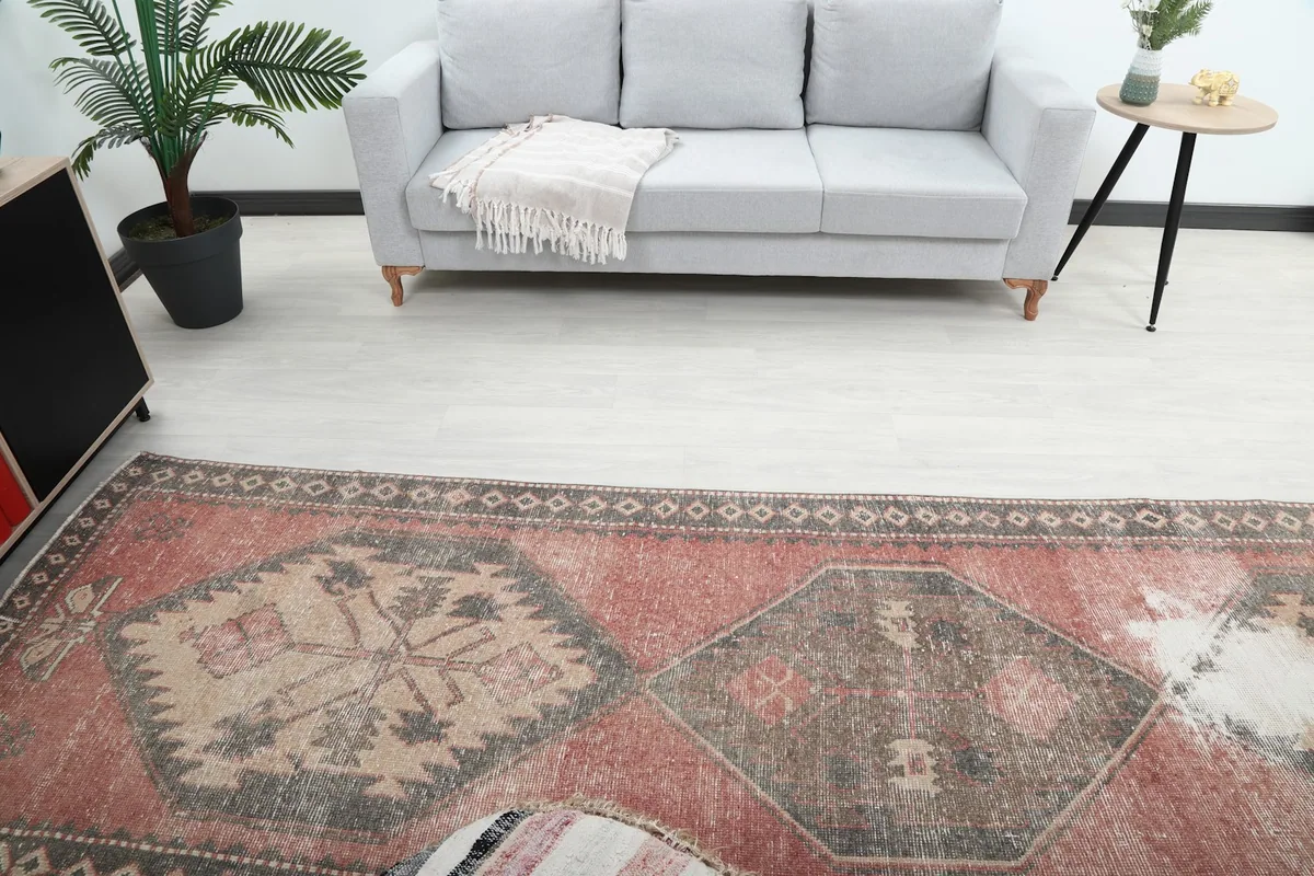 Overhead view showing the rug's pattern detail and surrounding room elements
