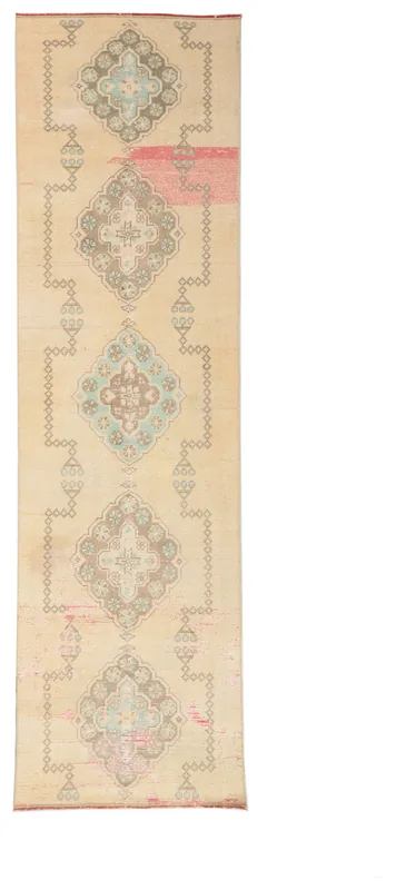 Full top view of the 2'9" x 9'10" ivory geometric medallion runner rug on a white background.