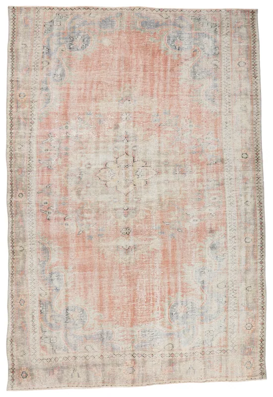 Full top view of the 6'6" x 9'3" vintage Anatolian area rug with rose and beige tones
