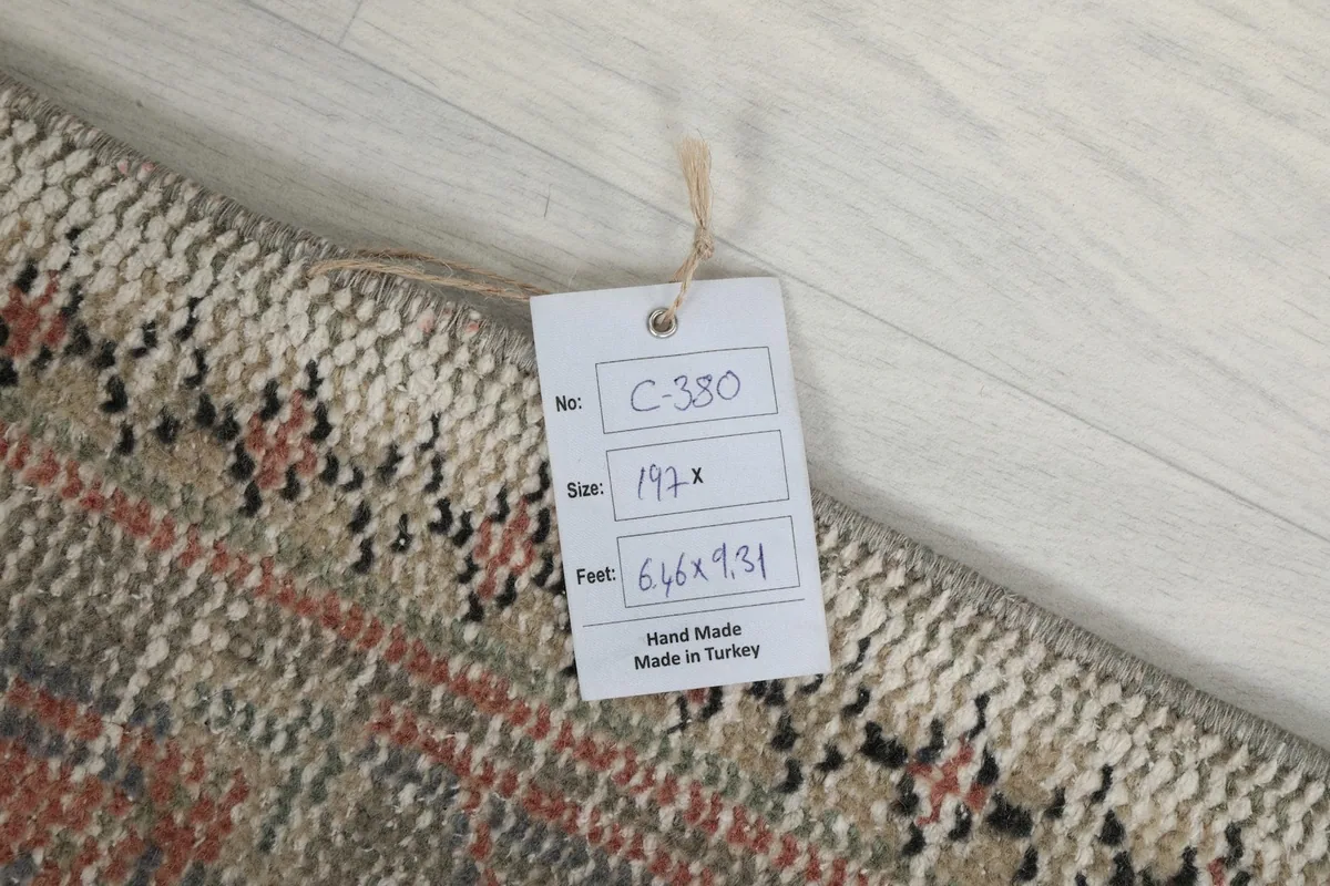 Product tag on the vintage Anatolian rug displaying item number, size in cm and feet, and origin
