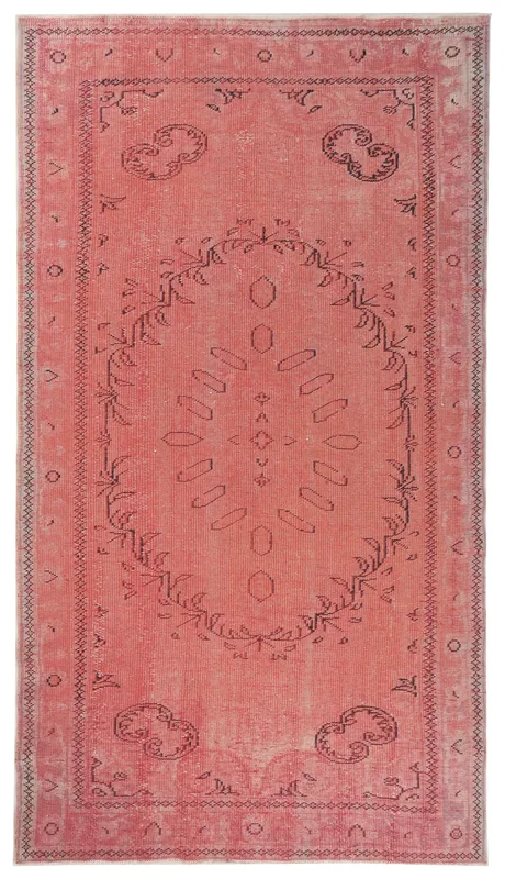Full overhead view of the rose geometric medallion vintage Anatolian rug
